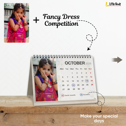 LittleNods Personalized Kids Desk Calendar 2026 with custom child photos on wooden office table
